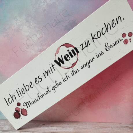 Holzschild mit Text: Ich liebe es mit Wein zu kochen, manchmal gebe ich ihn sogar ins Essen