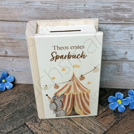 Sparbuch aus Holz mit Schloss zum Öffnen und Motiv Zirkuszelt, Esel