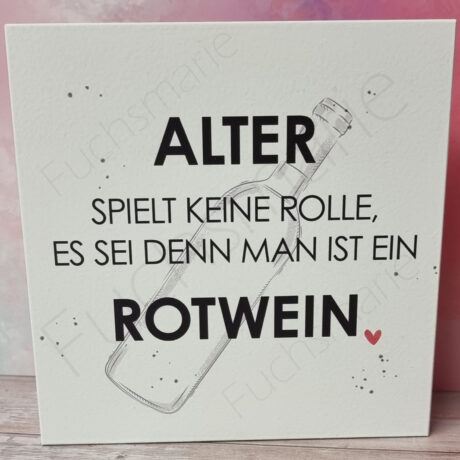 Holzschild mit Text: Alter spielt keine Rolle, es sei denn man ist ein Rotwein.