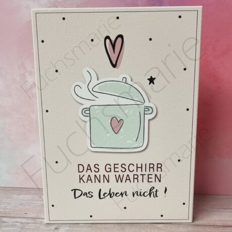 Holzschild mit text: Das Geschirr kann warten. Das Leben nicht.